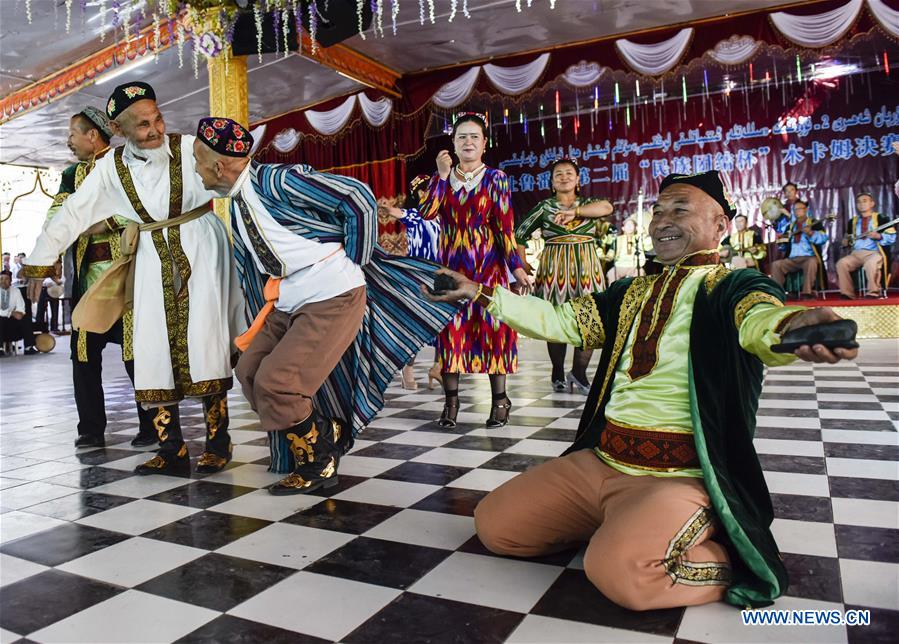 Folk artists attend traditional Muqam contest in China's Xinjiang