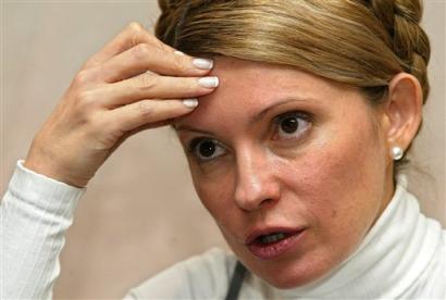 Ukraine's fiery opposition leader Yulia Tymoshenko speaks during a news conference in Kiev, Tuesday, Jan. 4, 2005. Tymoshenko expects to be named prime minister of Ukraine, saying that Viktor Yushchenko, the apparent winner of the Dec. 26 presidential revote, promised her the job in exchange for her support. (AP Photo/Sergey Ponomarev) 