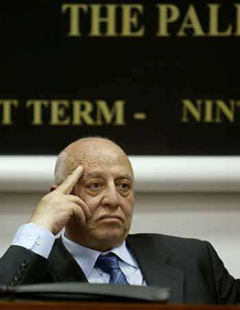 Palestinian Prime Minister Ahmed Qurie looks on during the session of Palestinian Legislative Council in the West Bank city of Ramallah, February 24, 2005. The Palestinian parliament approved a new cabinet after Qurie bowed to lawmakers' demands, bringing in mostly new faces to replace members of Yasser Arafat's old guard. [Reuters] 