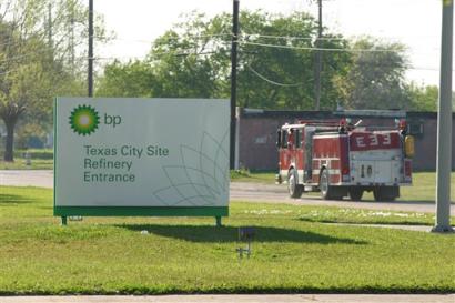 A Texas city fire truck leaves a BP Oil Refinery in Texas City Wednesday March 23, 2005 after an explosion which injured at least 10 people. (AP Photo/ Michael Stravato) 