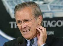 U.S. Secretary of Defense Donald Rumsfeld listens to questions at a joint news conference with Multi-National Force-Iraq Gen. George Casey at the Pentagon in Washington, DC June 27, 2005. 