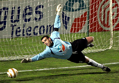 Bordeaux's goalkeeper Ulrich Rame, stretches to make a save during his French ligue cup soccer match at Chaban Delmas stadium in Bordeaux, southwestern France, December 20, 2005. 