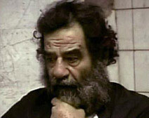 Pulled from a hole, Saddam asks: 'America, why?'