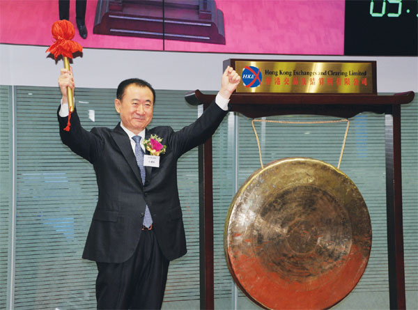 Wanda shares tumble in HK debut