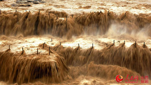 The Yellow River's Hukou Waterfall in summer flood season