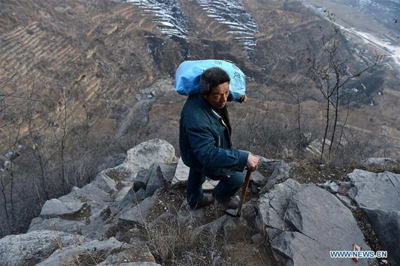 60-year-old postman working in mountainous area for 30 years