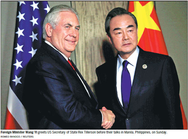 Wang, US counterpart hail interaction of two countries