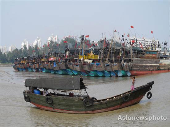 Boats take refuge in port in Haikou