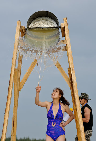 Bodyguard candidates toughen up on the beach