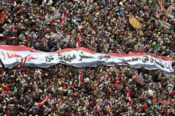 Egyptians pray for commitment to democracy