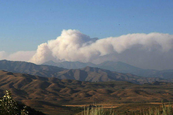 Wildfires blaze across US west