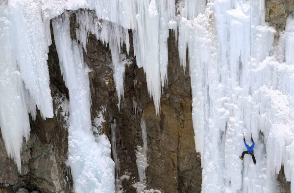 Climber on Swiss ice wall