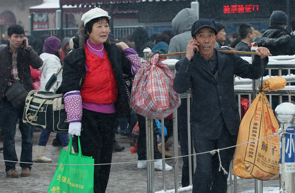 Snow, rain to affect travel across China