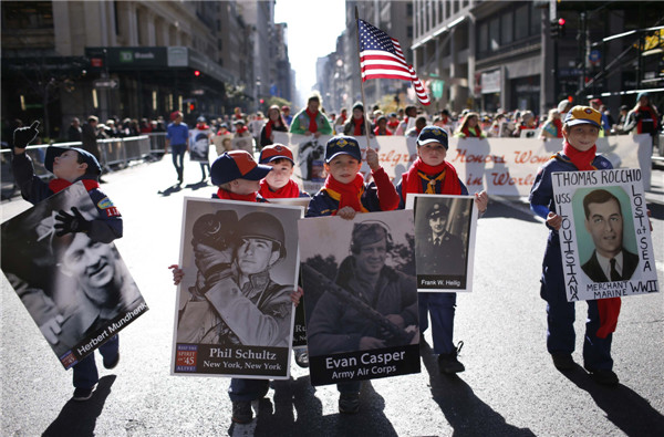 US honors its veterans with ceremonies, parades