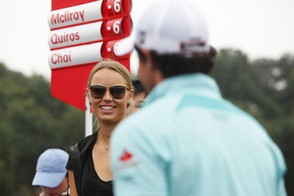 World No 1 Wozniacki cheers for golfer boyfriend