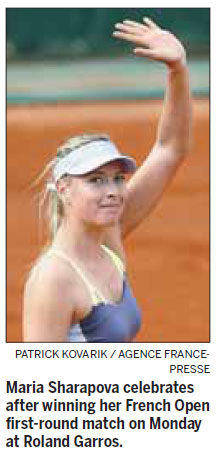 Sharapova pledges tough love to photo buddy Bouchard