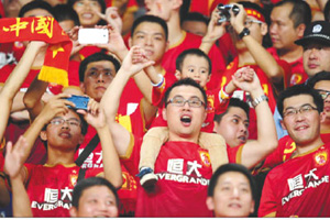 In photos: Frenchman Perrin named coach of Chinese soccer team