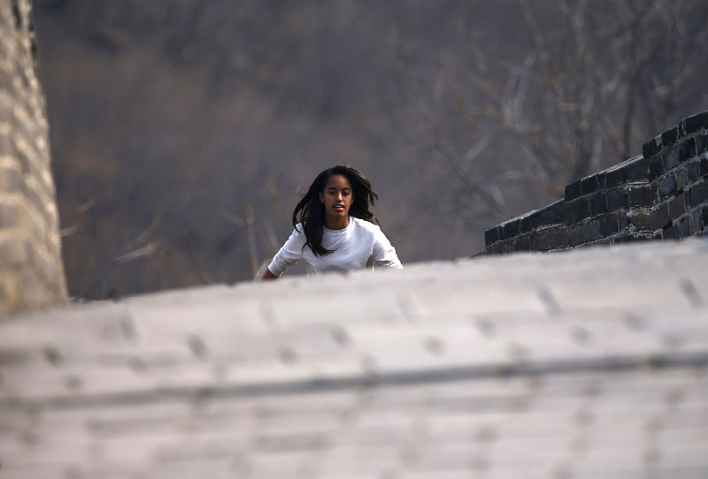 Obamas climb Great Wall after lunch of trout