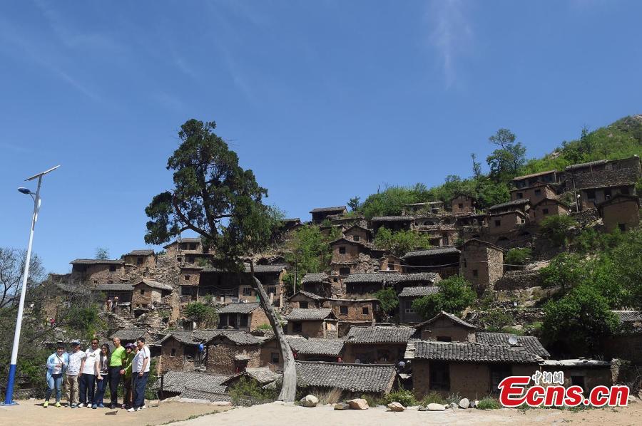 Old stone village braces for new visitors