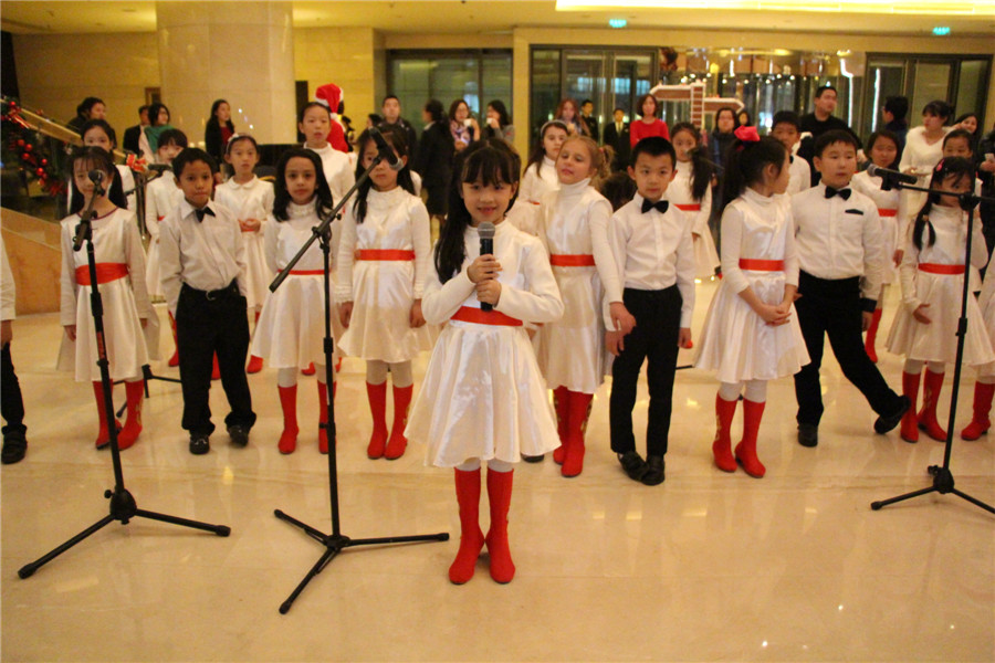 Beijing gets into Christmas spirit with illuminated trees, carols and the smell of cinnamon