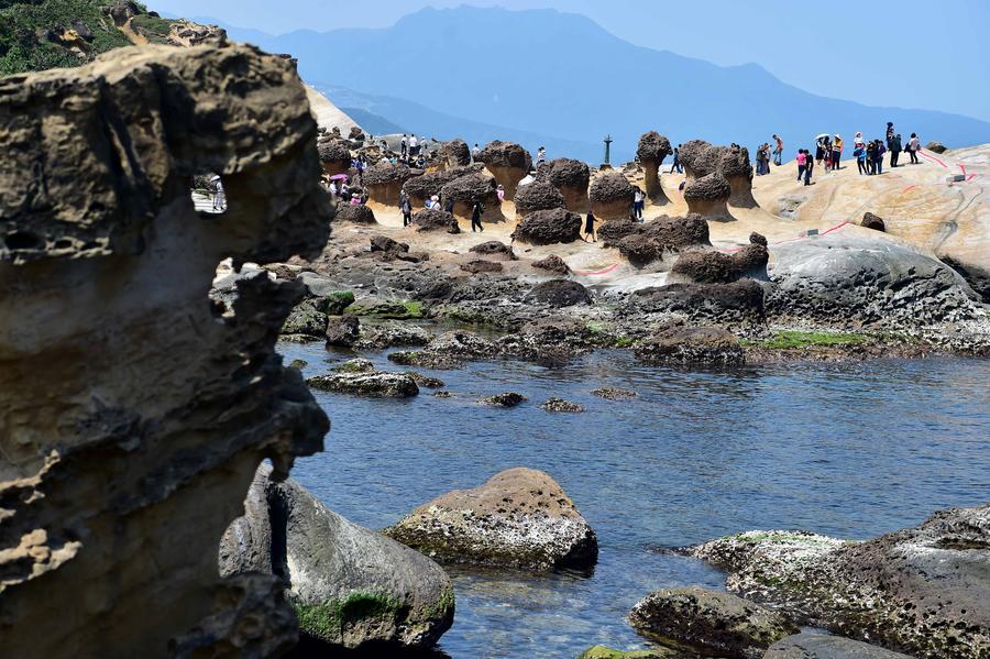 Tourists enjoy scenery of Yehliu Geopark in Taiwan