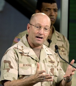 U.S. Air Force Gen. Gene Renuart, gestures during a news conference at Central Command Center, Doha, Qatar in this April 10, 2003 file photo.