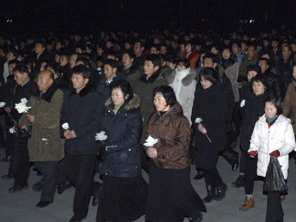 People in Pyongyang mourn death of Kim