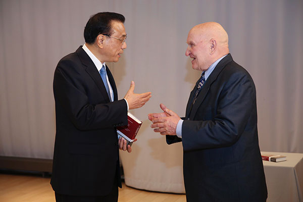 Premier meets Eurasian Sinologists; calls for more communication