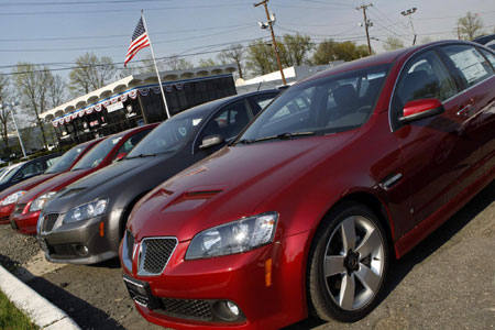 GM to cut 21,000 US factory jobs, shed Pontiac