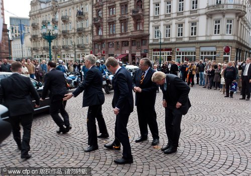 German president pelted with eggs