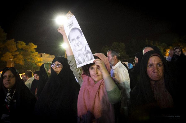 Supporters of Iran presidential candidate gather