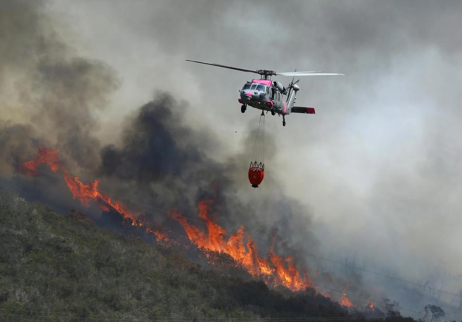 13,000 more asked to evacuate in California fire