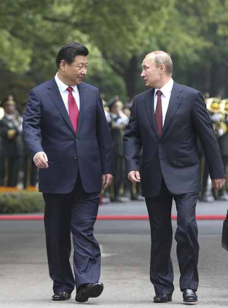 Putin says Russia-China ties enter new stage