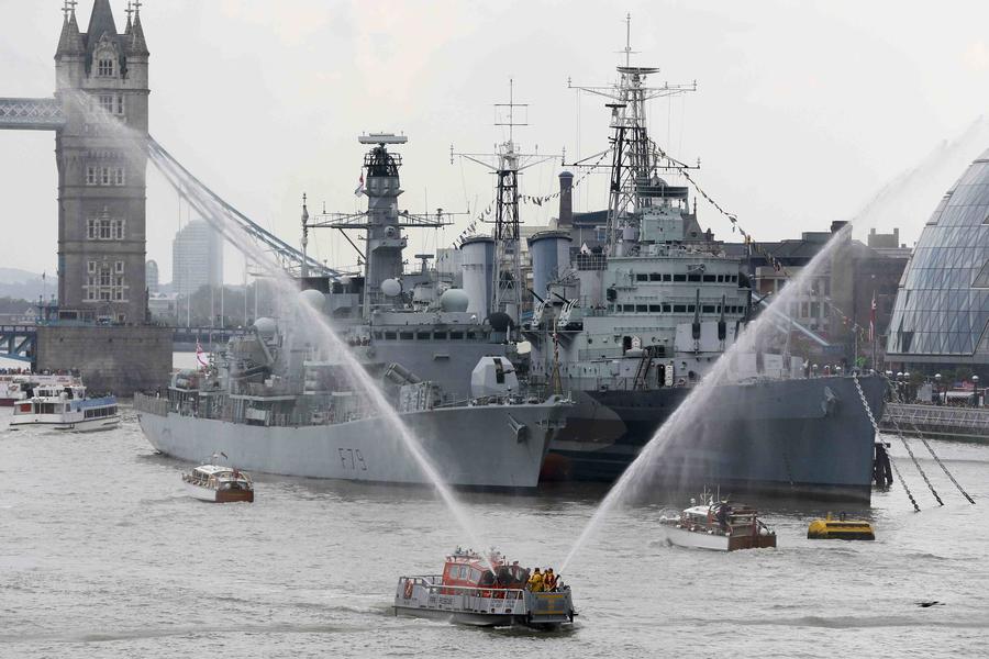 Flotilla sails down Thames to mark Queen's long reign