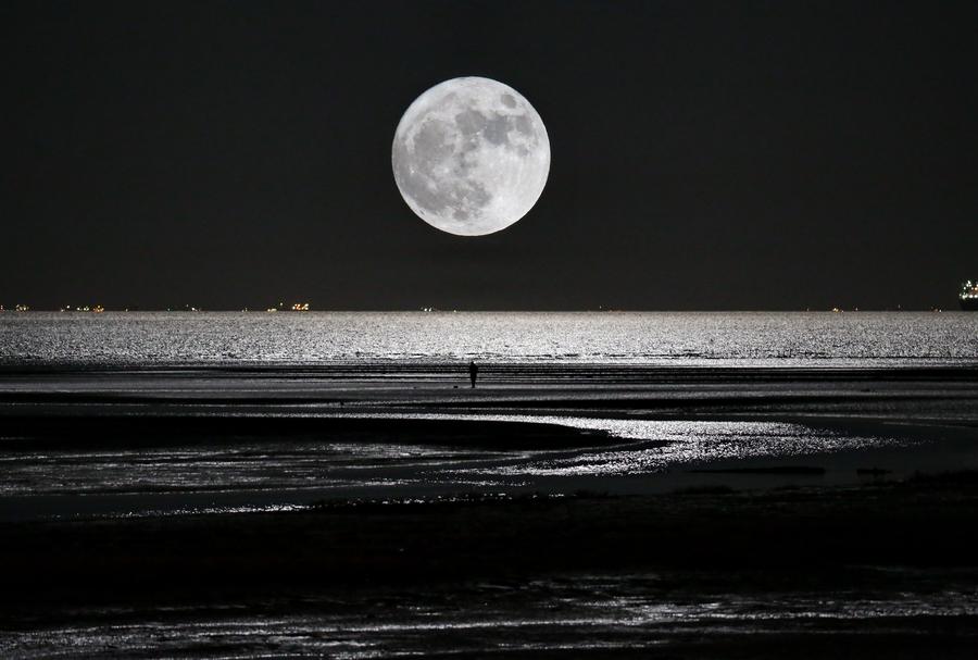 'Supermoon' shines over skies