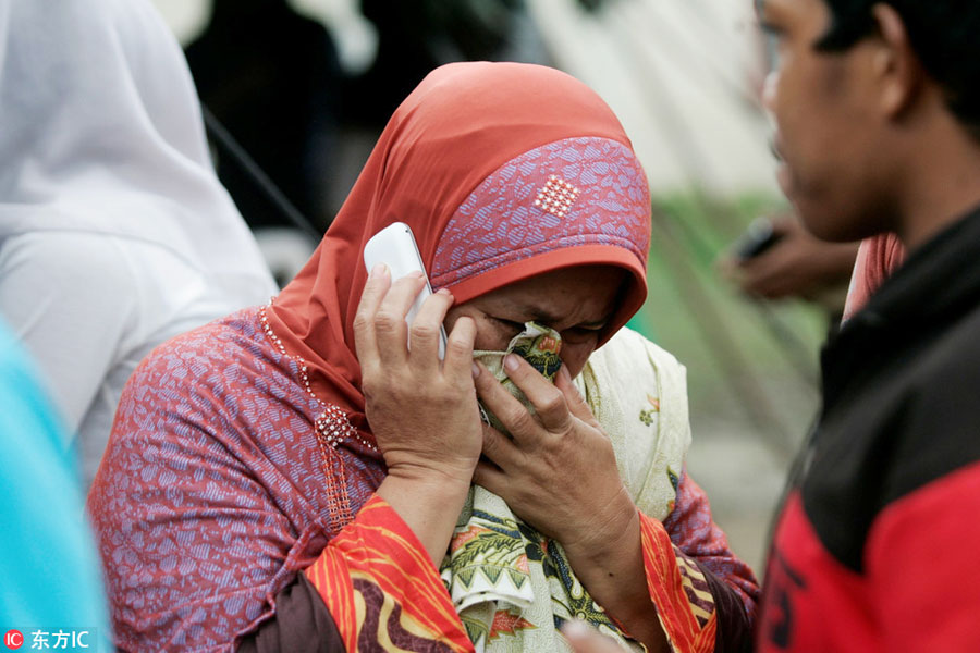 Nearly 100 killed, hundreds hurt as quake strikes Indonesia