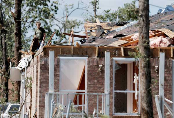 Tornadoes, storms kill 11 in US South