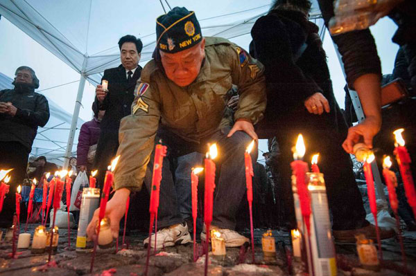 Thousands in NYC see off slain police officer